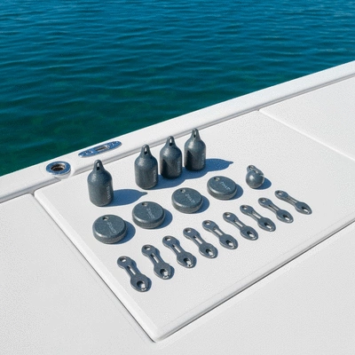 Sustainable downrigger gear on a boat deck, clear water in background